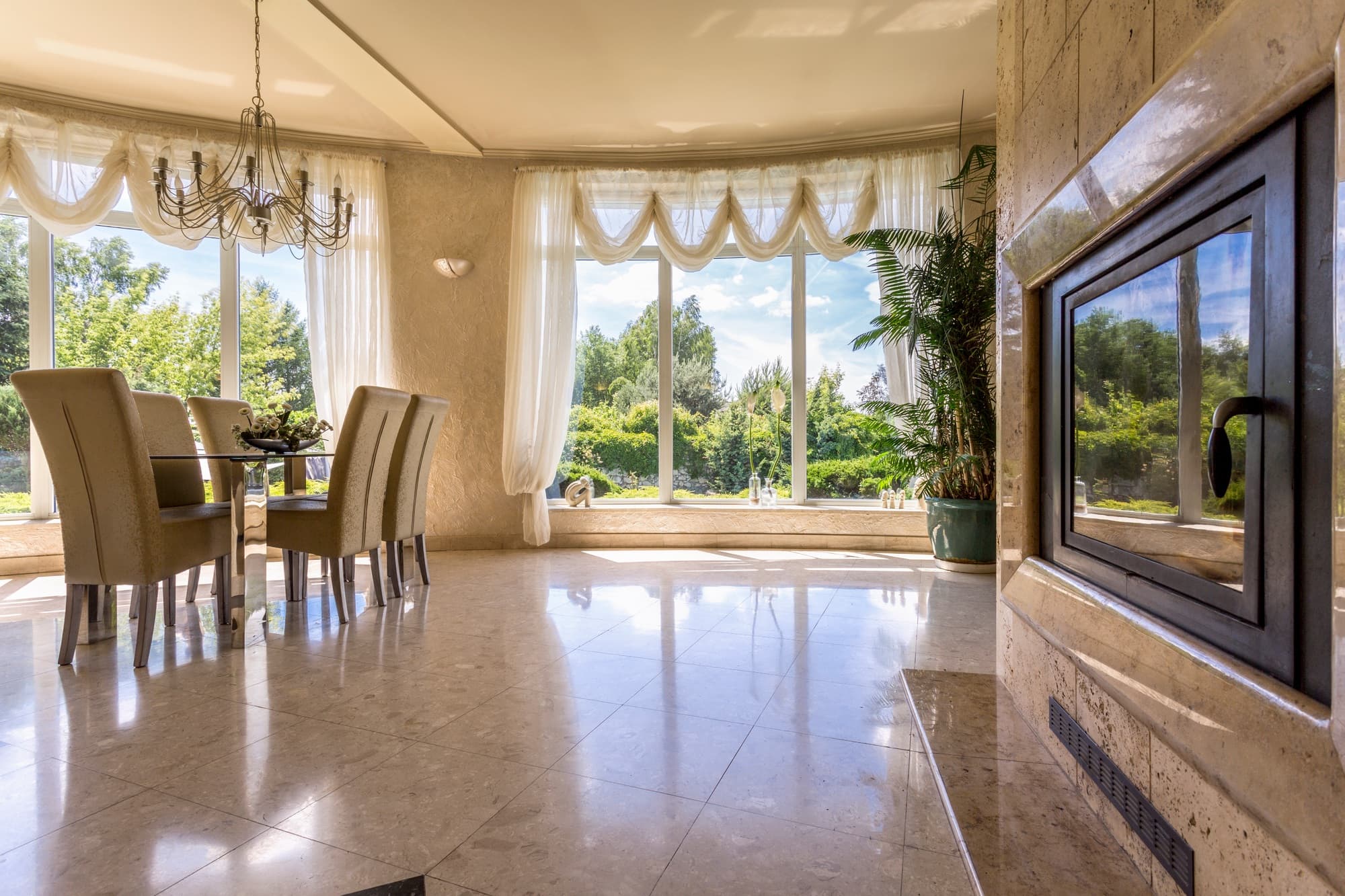 Spacious dining room with garden windows