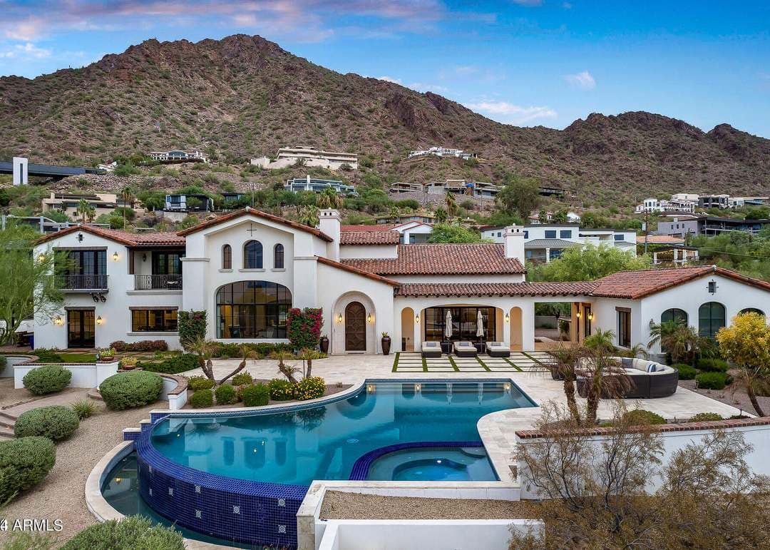 Arizona desert home framed by mountains
